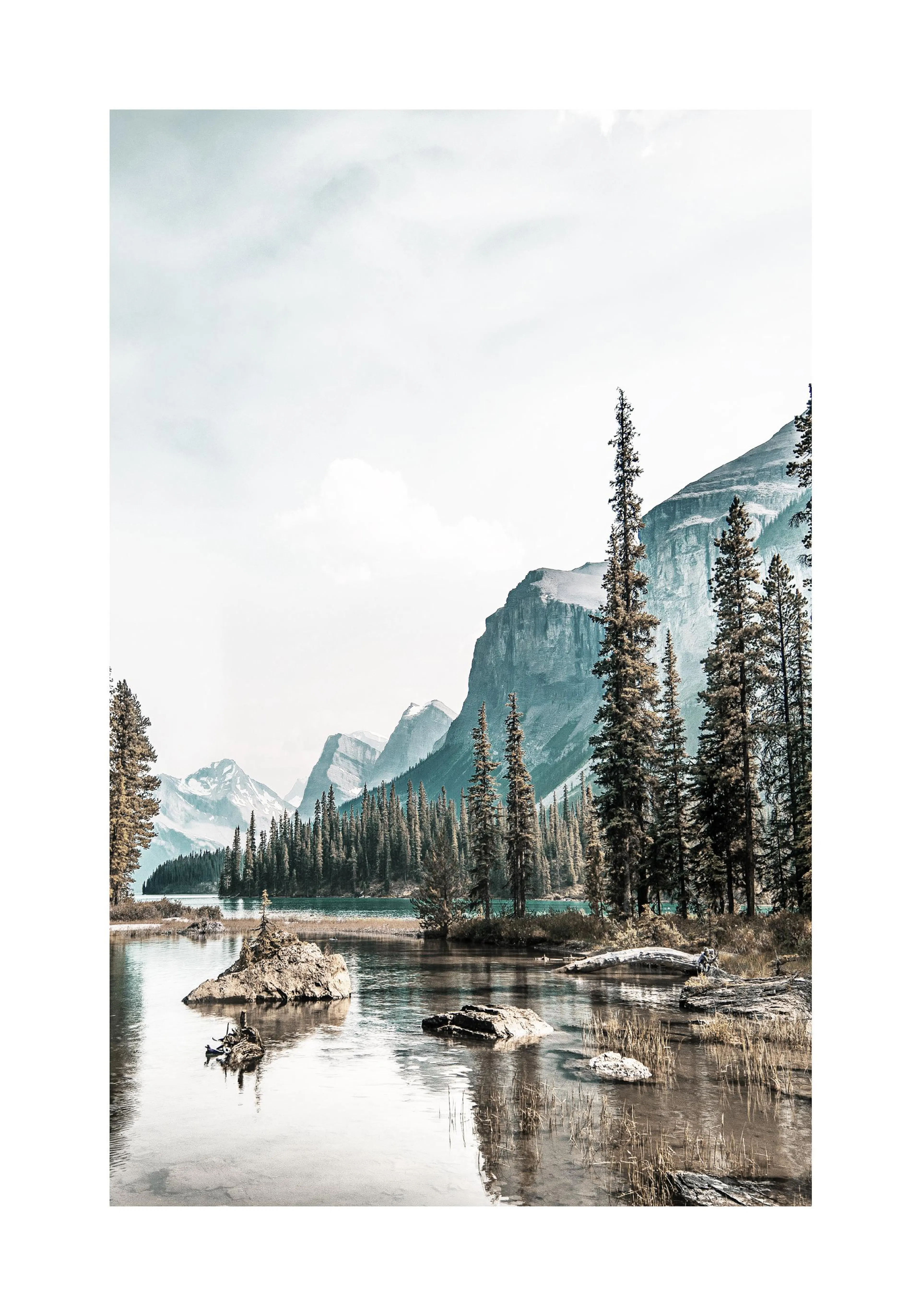 A poster featuring a tranquil lake surrounded by tall pine trees and majestic mountains under a soft sky.