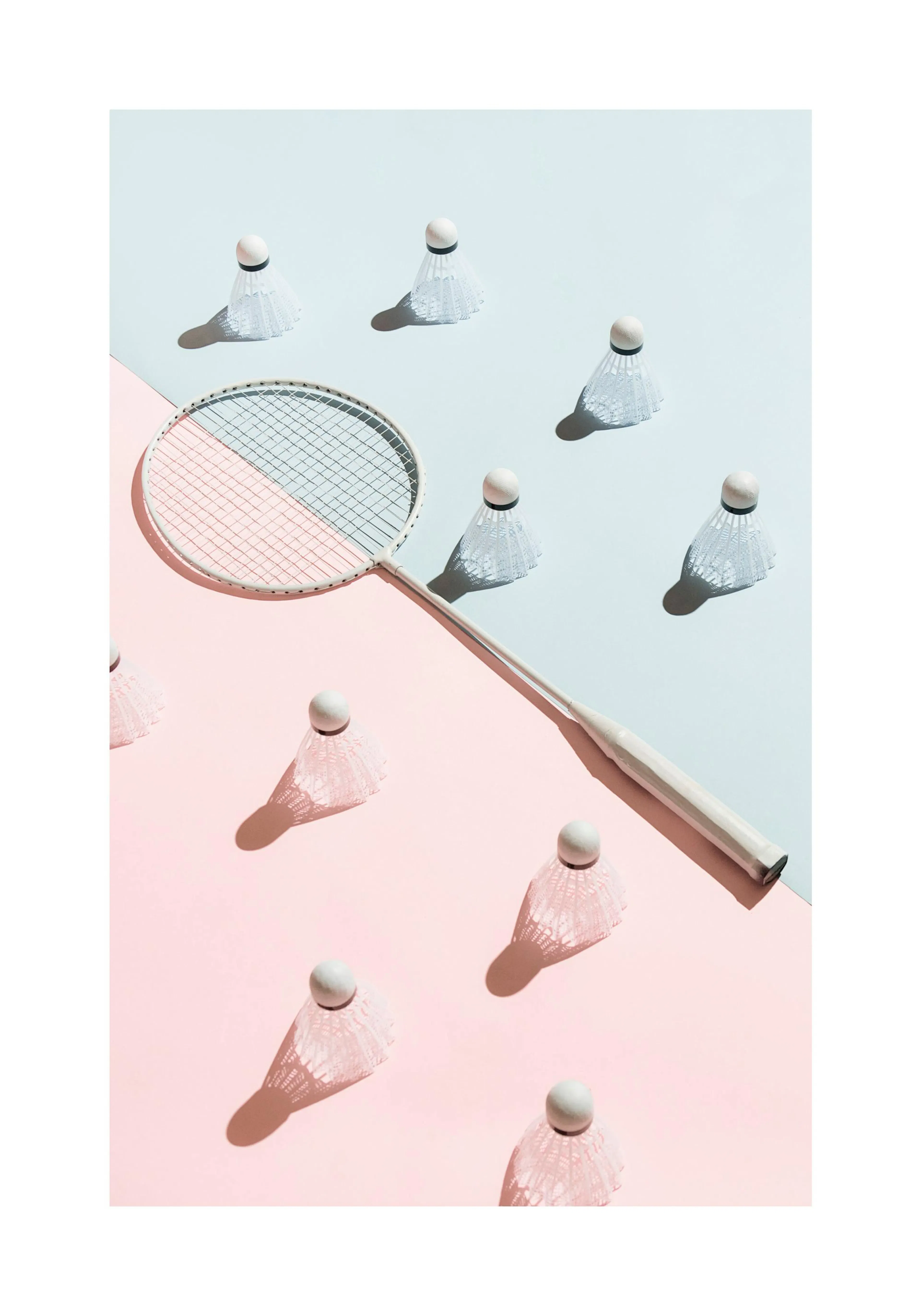 A poster of a white badminton racket and shuttlecocks on a light blue and pink background.