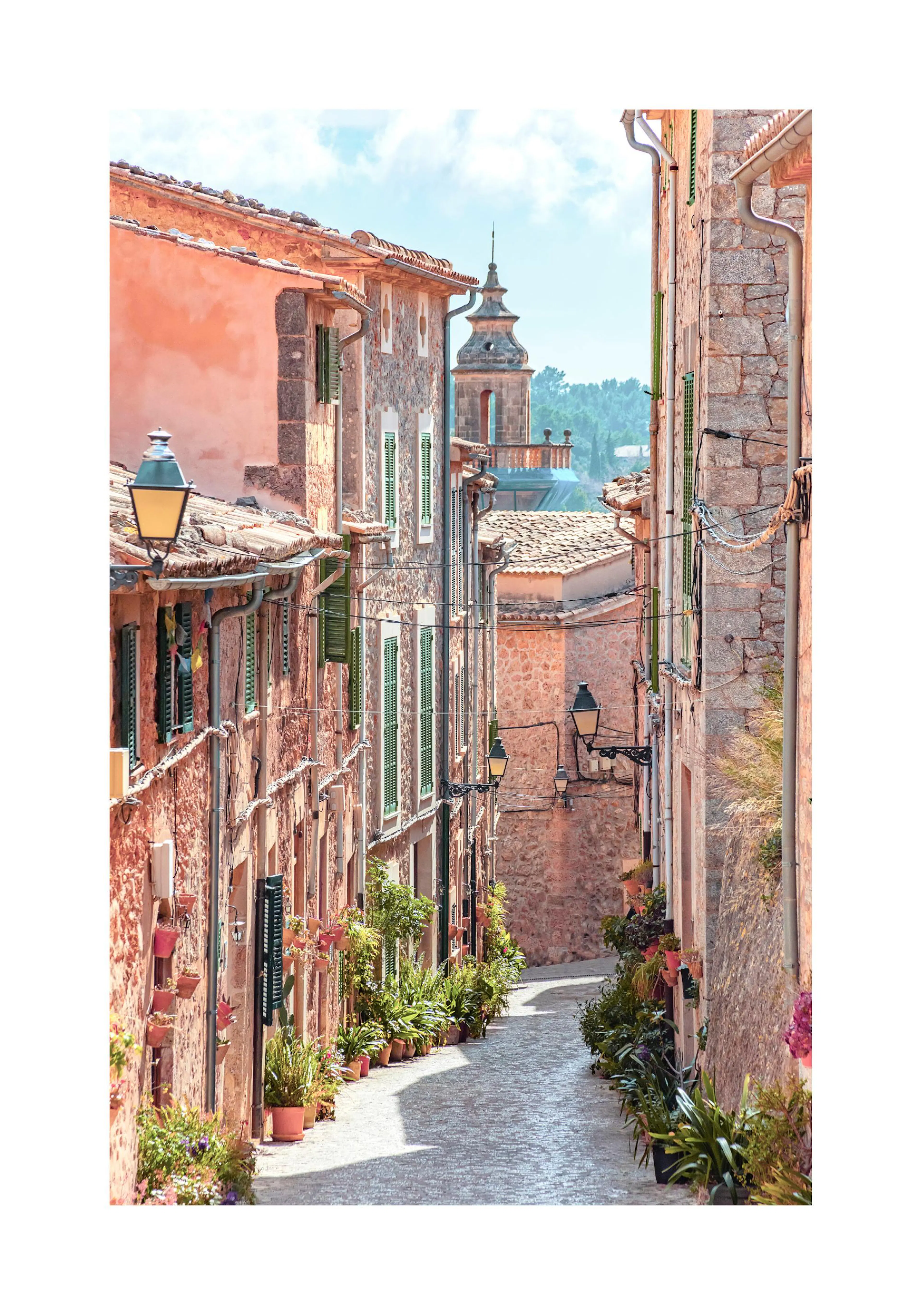A captivating poster of a narrow European street with old stone buildings, green window shutters, and potted plants.