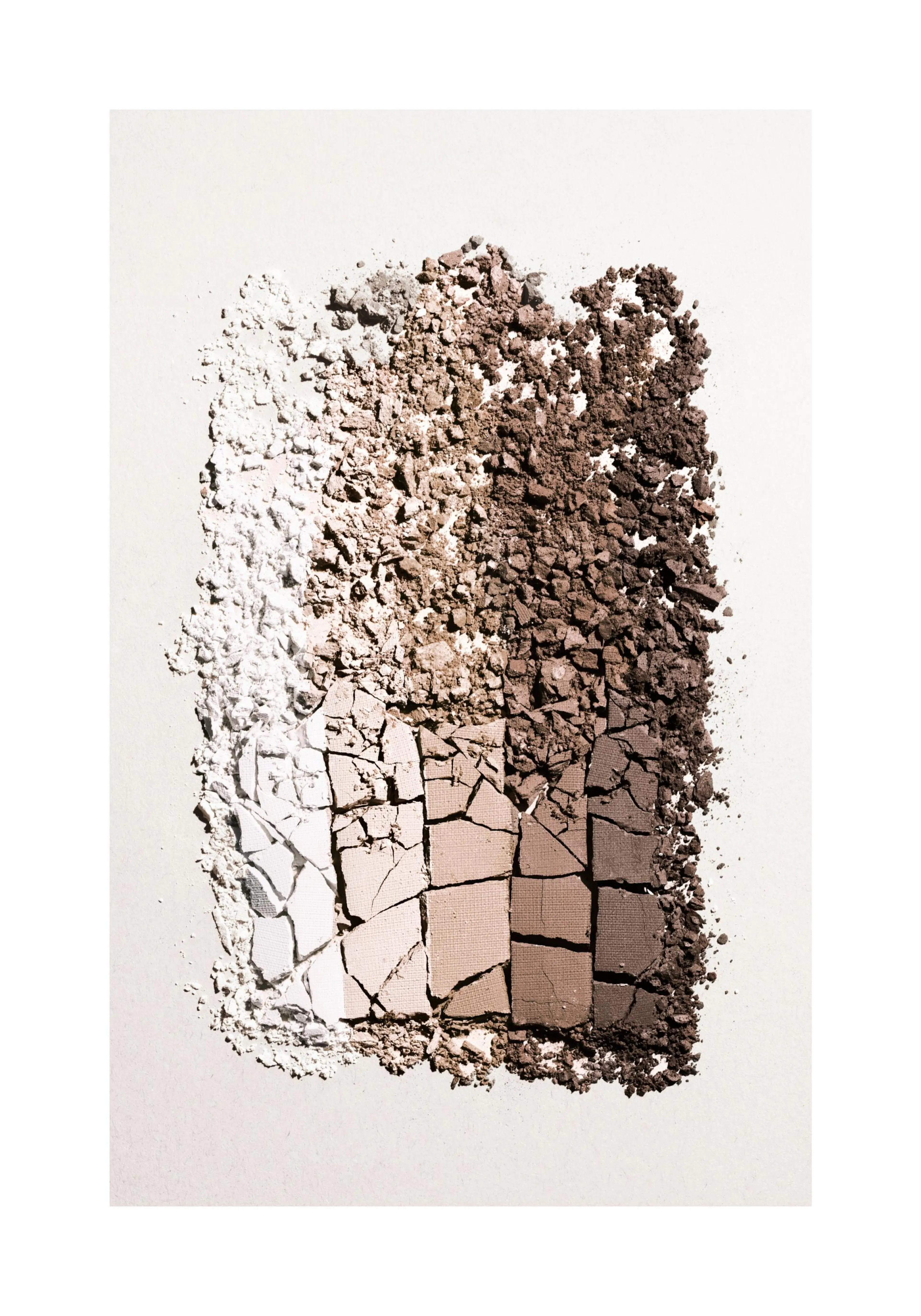 A poster featuring crushed white, beige, and brown eyeshadow powders and broken compact squares on a light background.