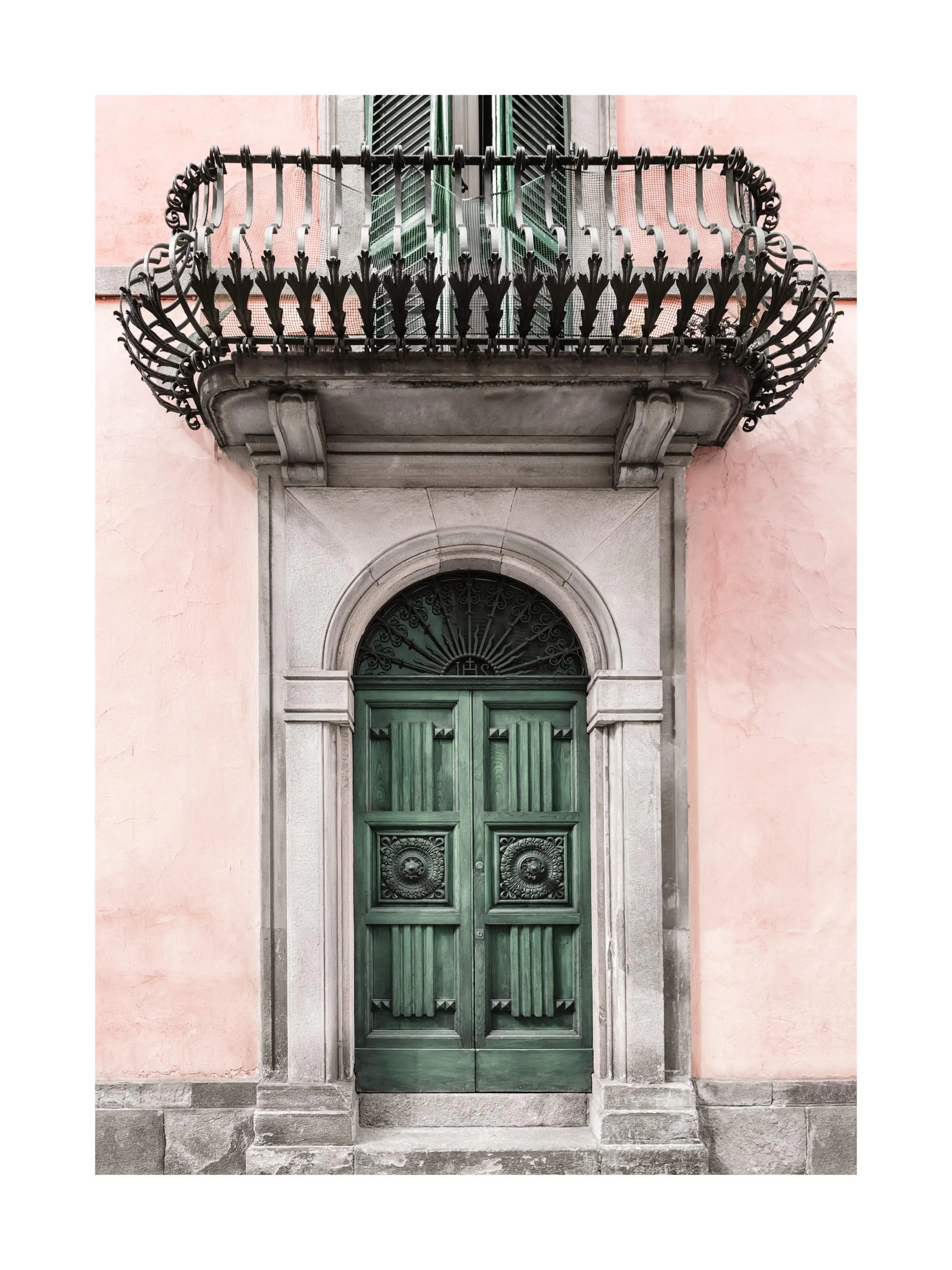 A poster featuring a green wooden door with an arched top and decorative ironwork, set against a light pink wall with a dark wro