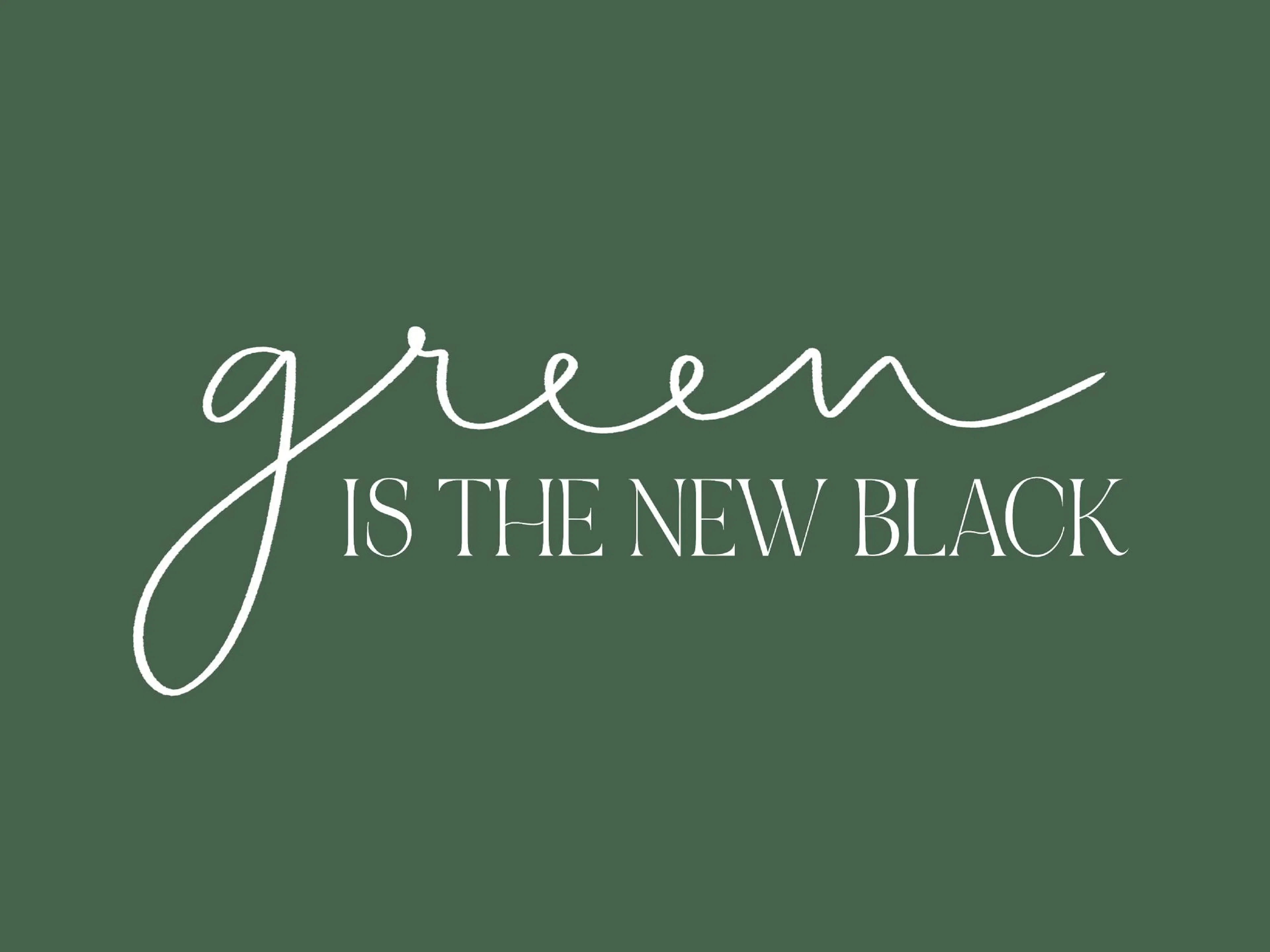 A poster with the phrase green IS THE NEW BLACK in white text on a dark green background. green is in script font.