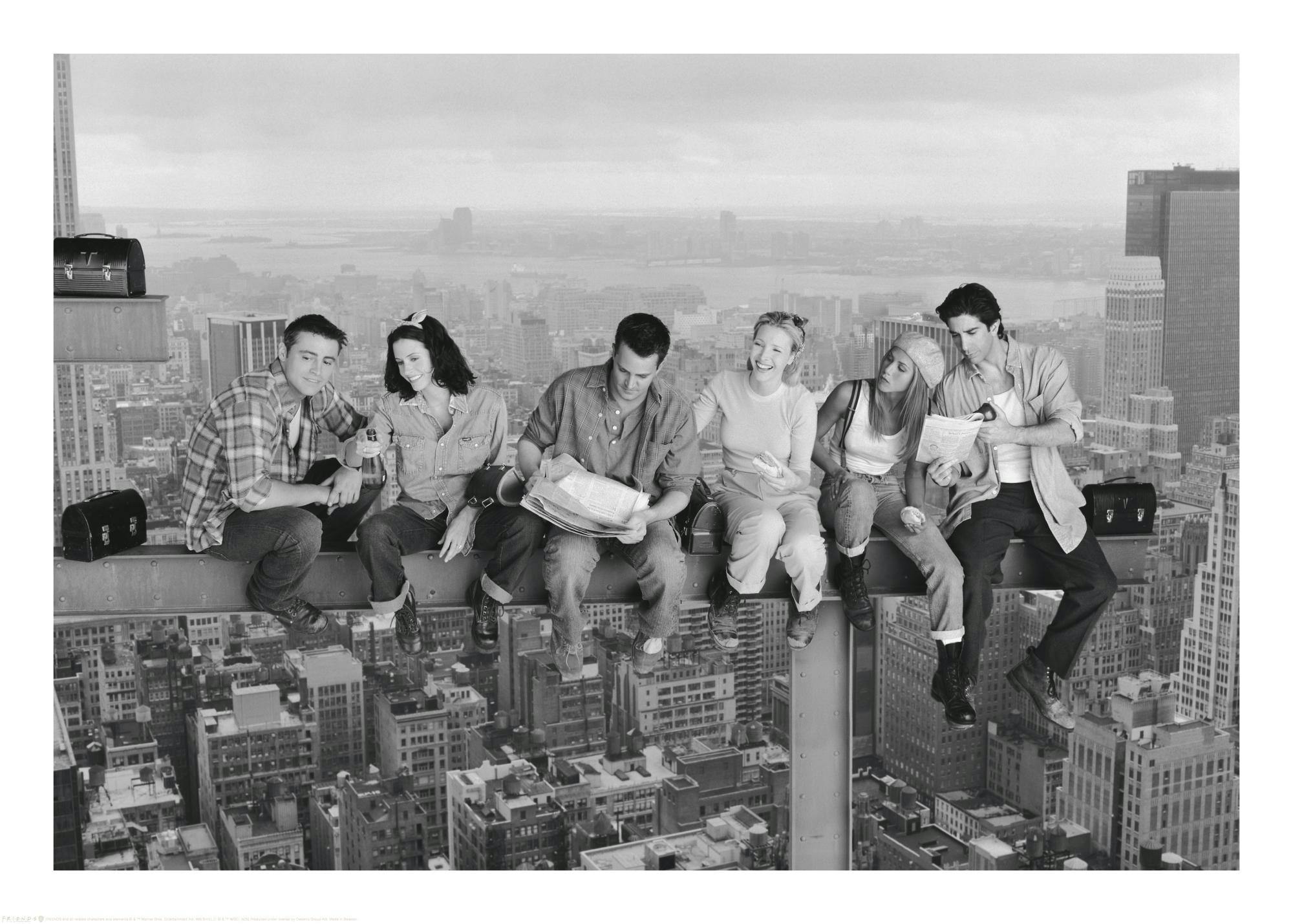 A black and white poster of the six Friends cast members sitting on a steel beam high above a city skyline.
