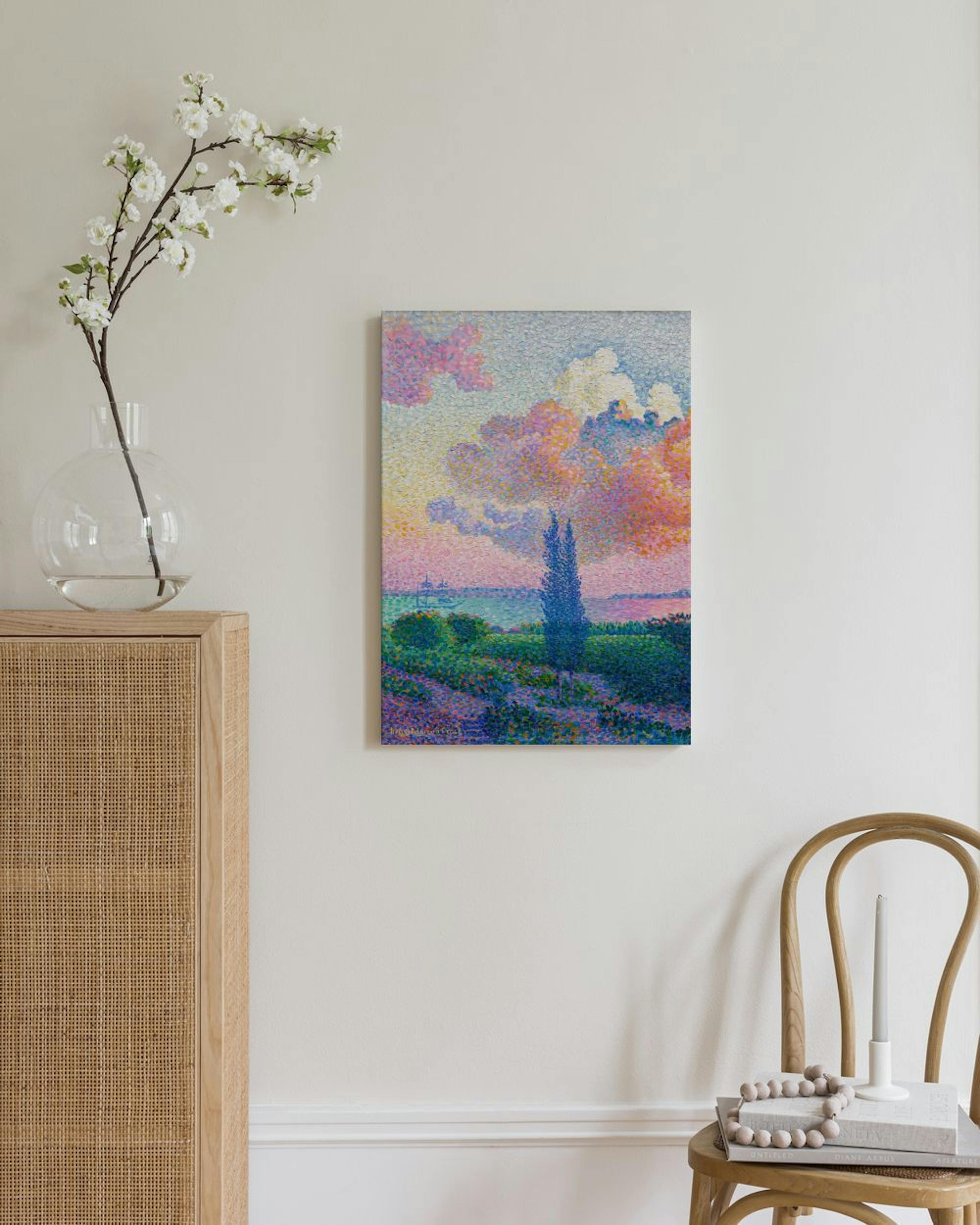 Pointillistinen kanvaasi, jossa vaaleanpunaisia ja oransseja pilviä purppuranpunaisen ja vihreän maiseman yllä. Kanvaasi roikkuu