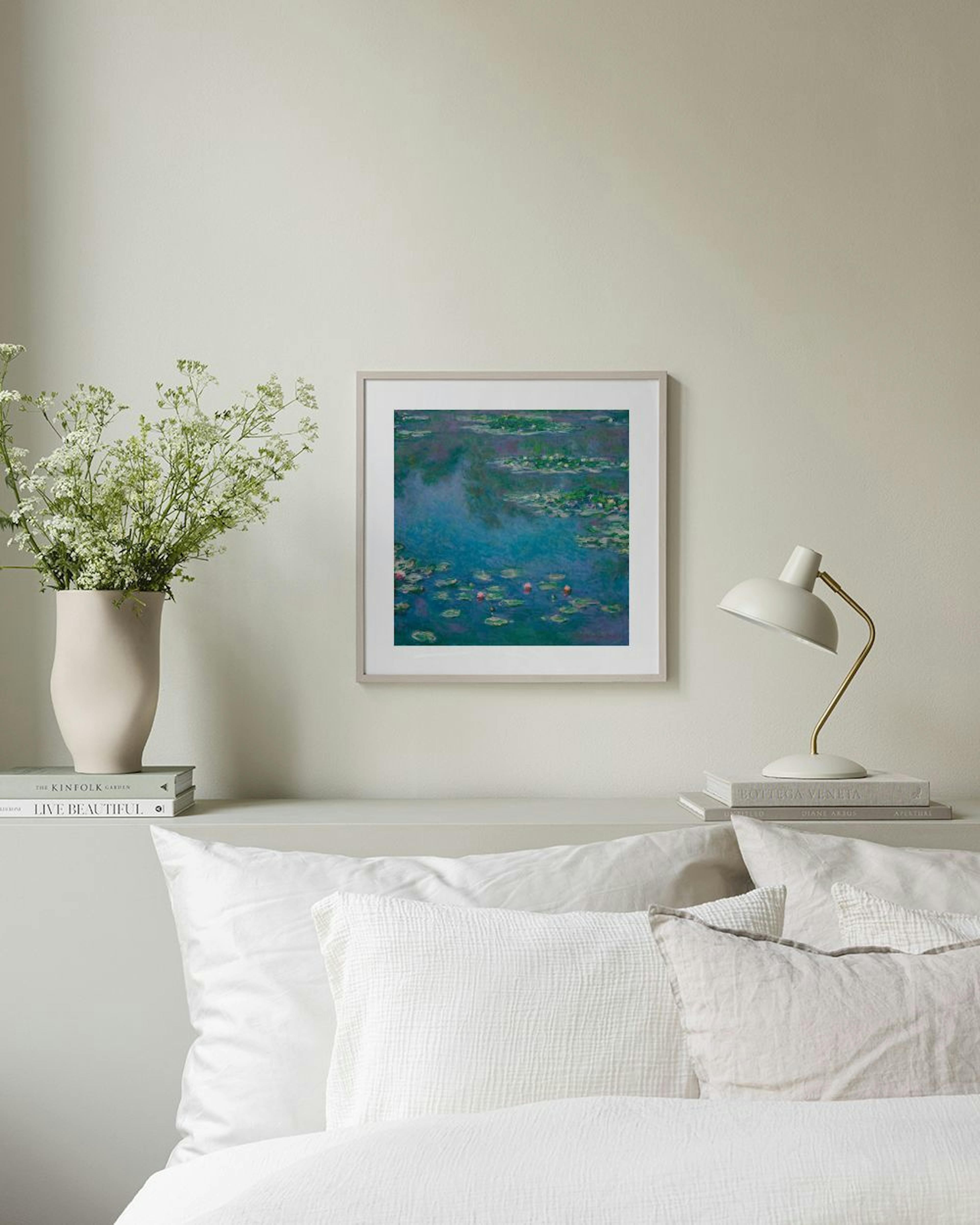 A poster featuring Monets Water Lilies painting in deep blue and green tones, hanging above a wooden shelf in a modern living ro