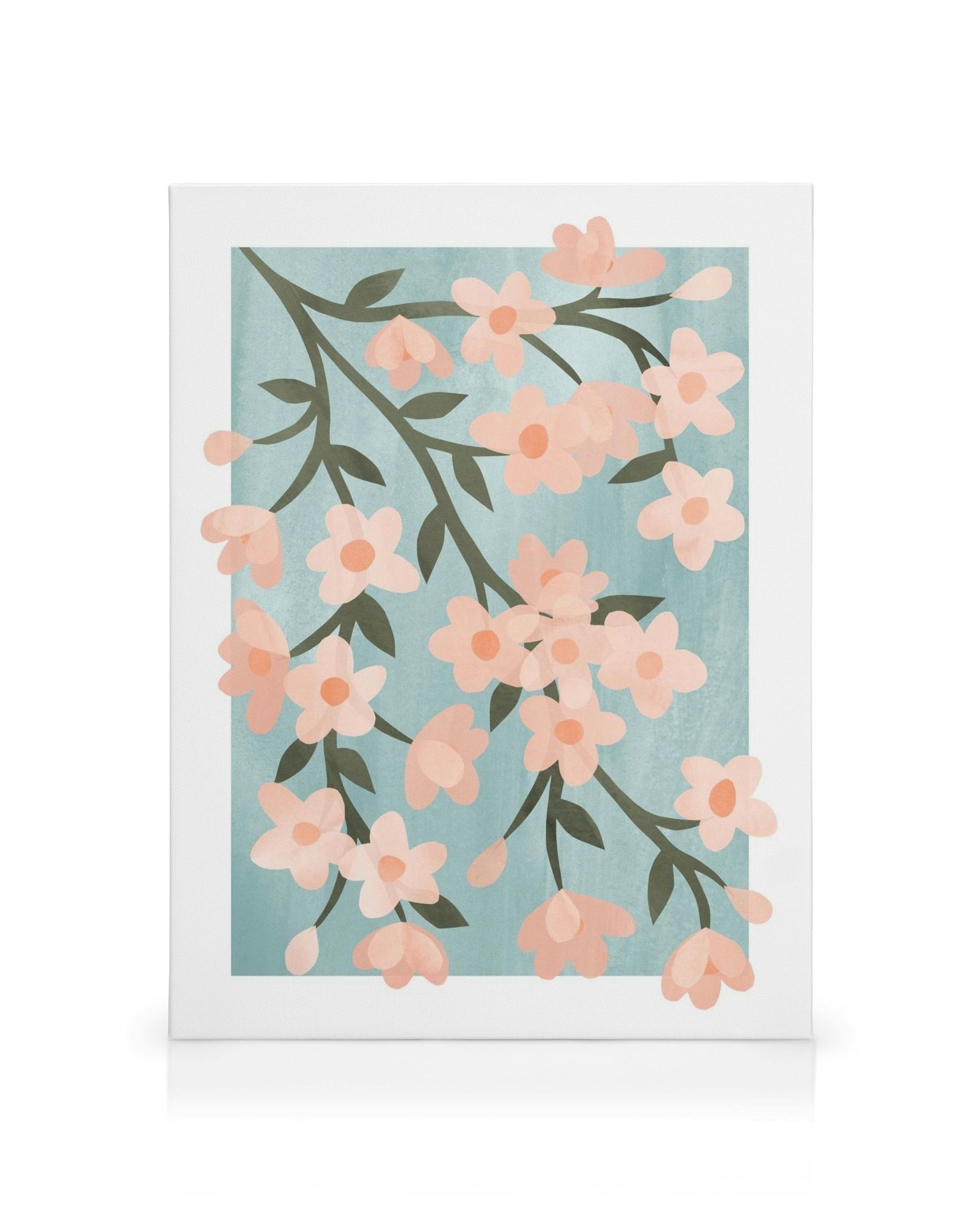 Un lienzo con ramas de cerezo y flores rosadas sobre un fondo azul claro.