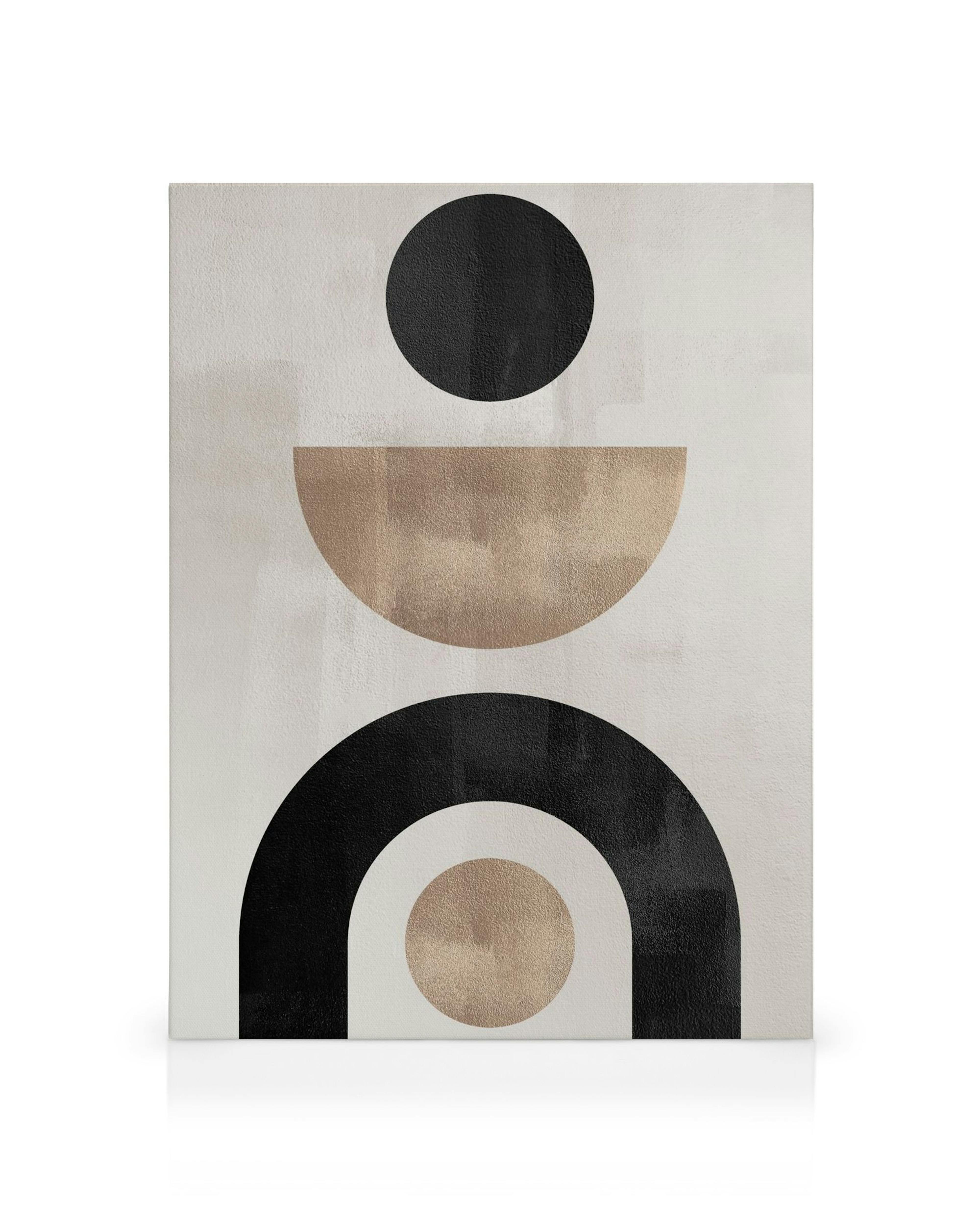 Toile abstraite avec des formes géométriques noires et or, dont des cercles et des demi-cercles.