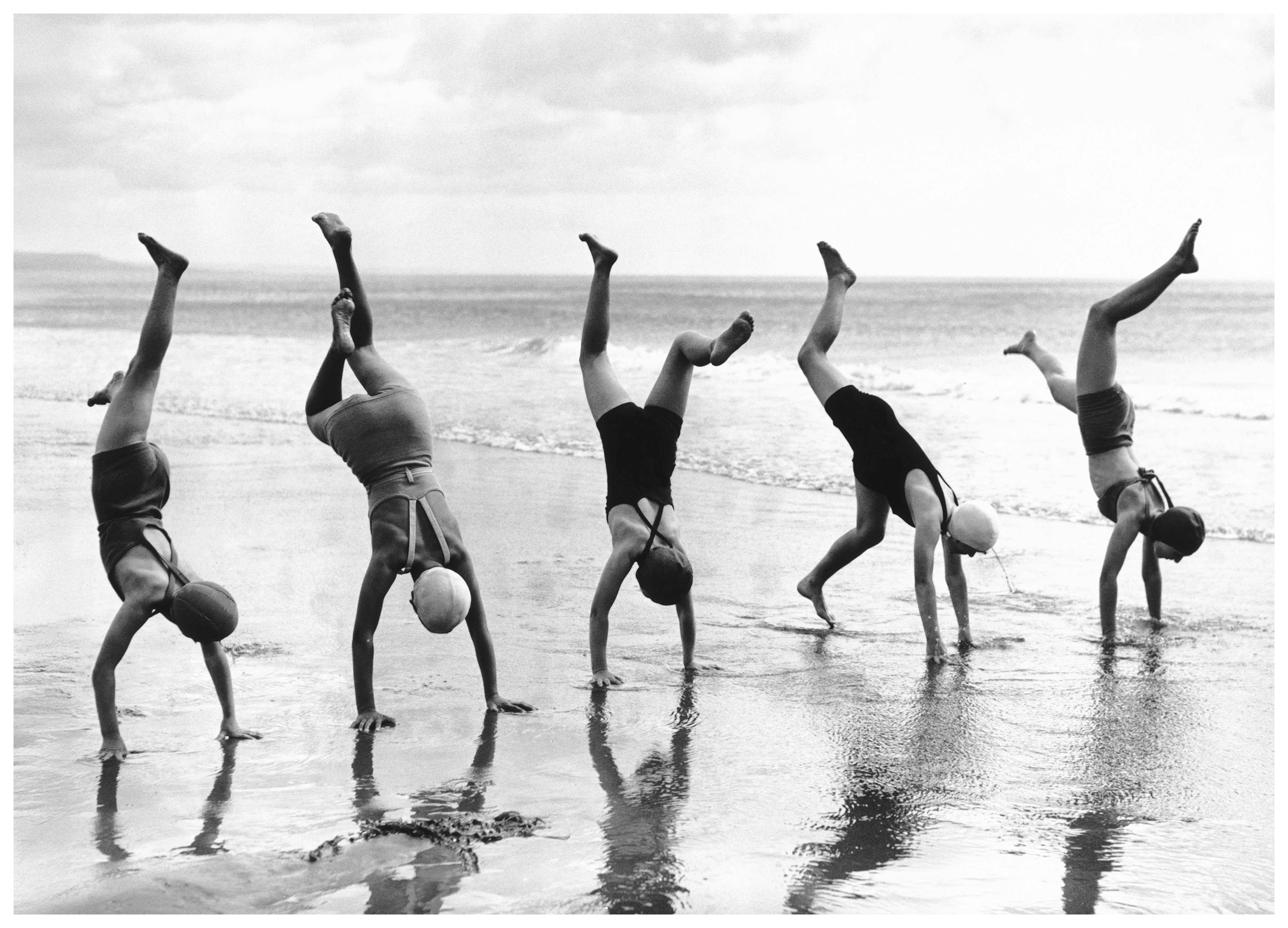 Handstands on Beach Poster (70x100 cm) - Poster Store