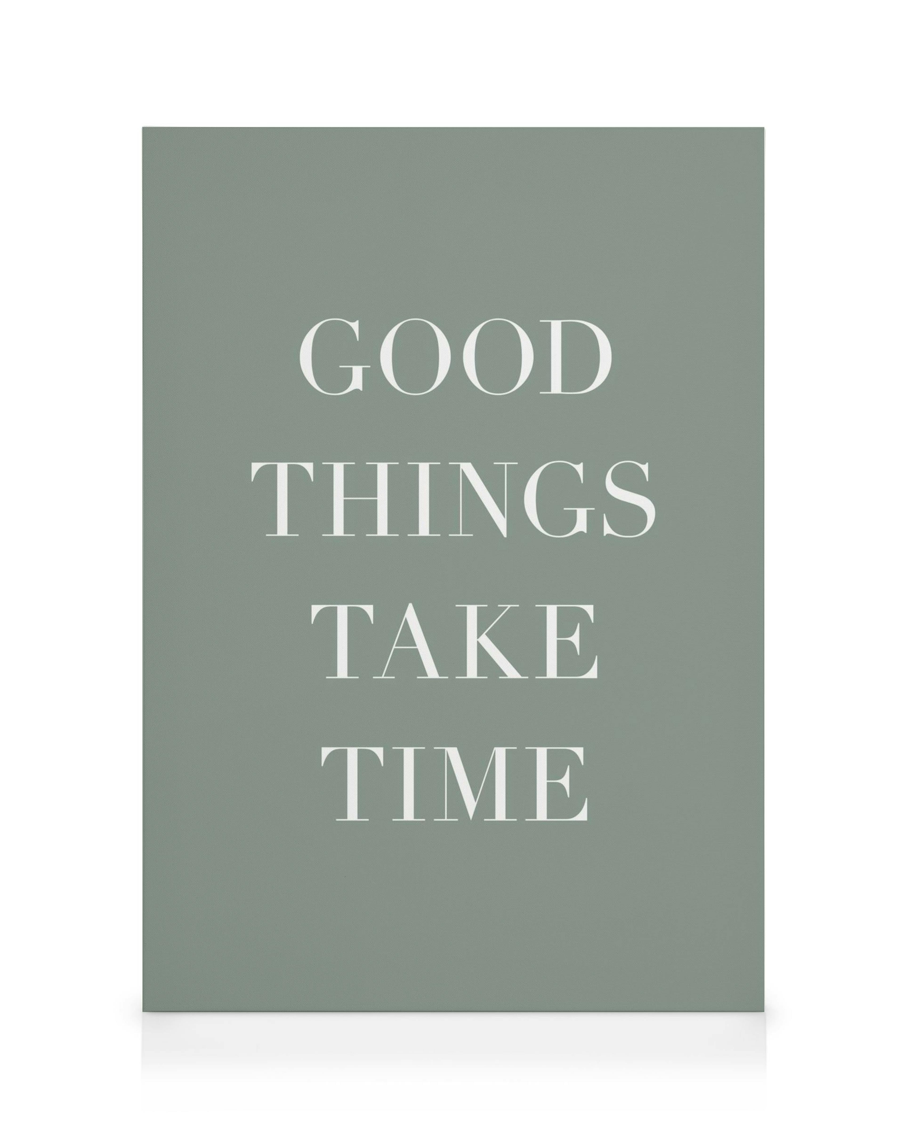Leinwandbild in Salbeigrün mit dem weißen Spruch: GOOD THINGS TAKE TIME.