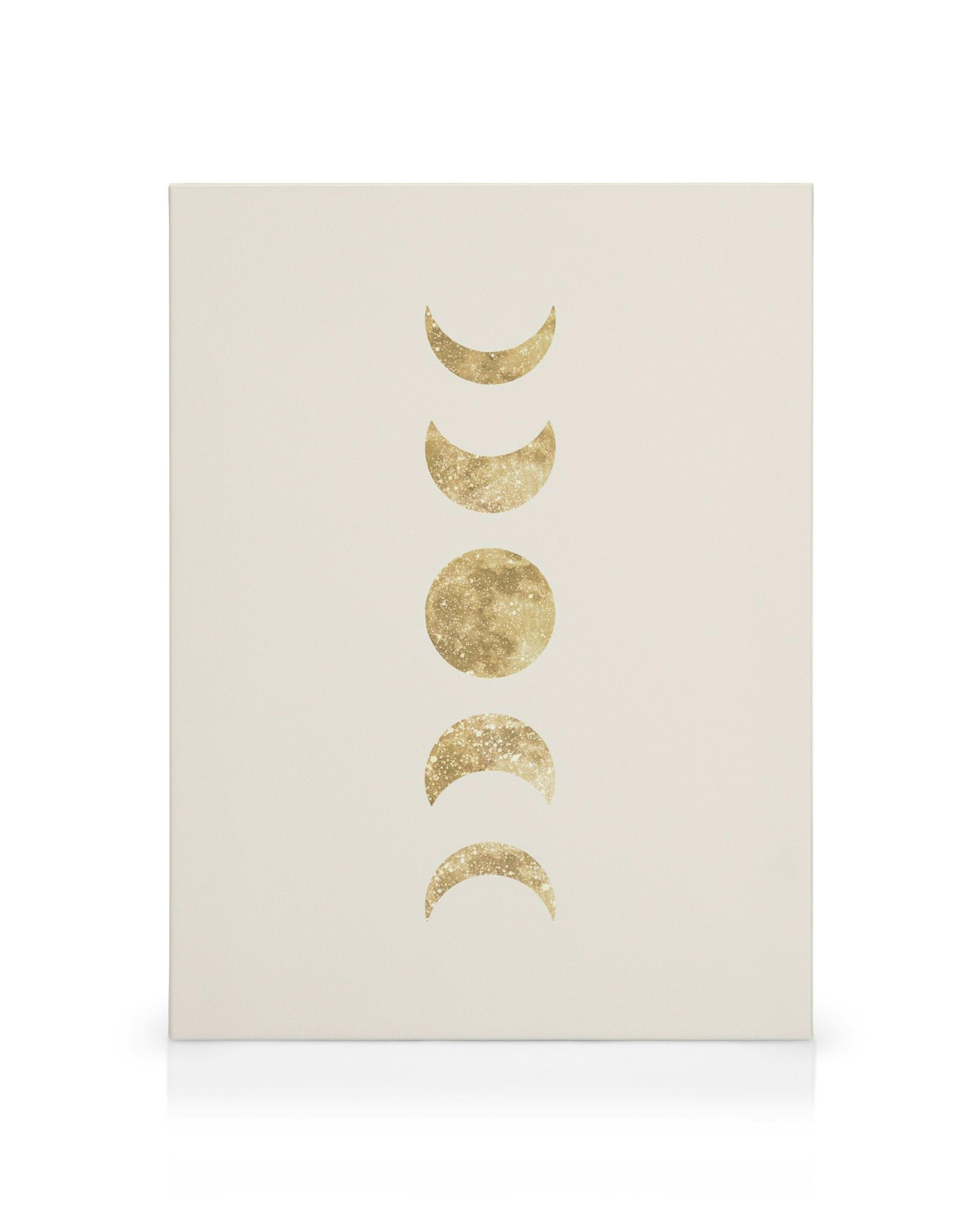 A canvas displaying the phases of the moon, with golden metallic textured crescents and a full moon on a cream background.