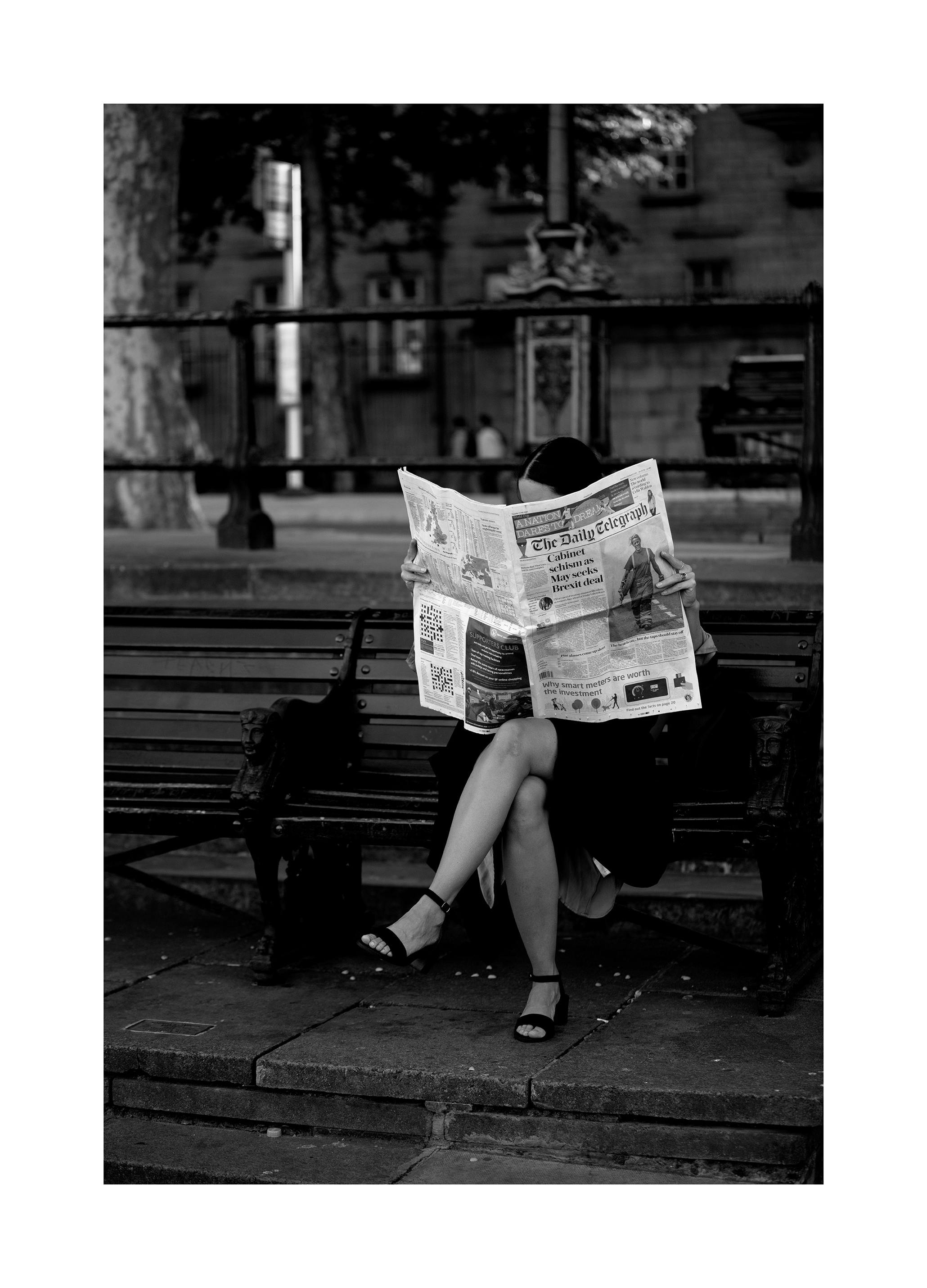 Newspaper Reading Poster (40x50 cm) - Poster Store