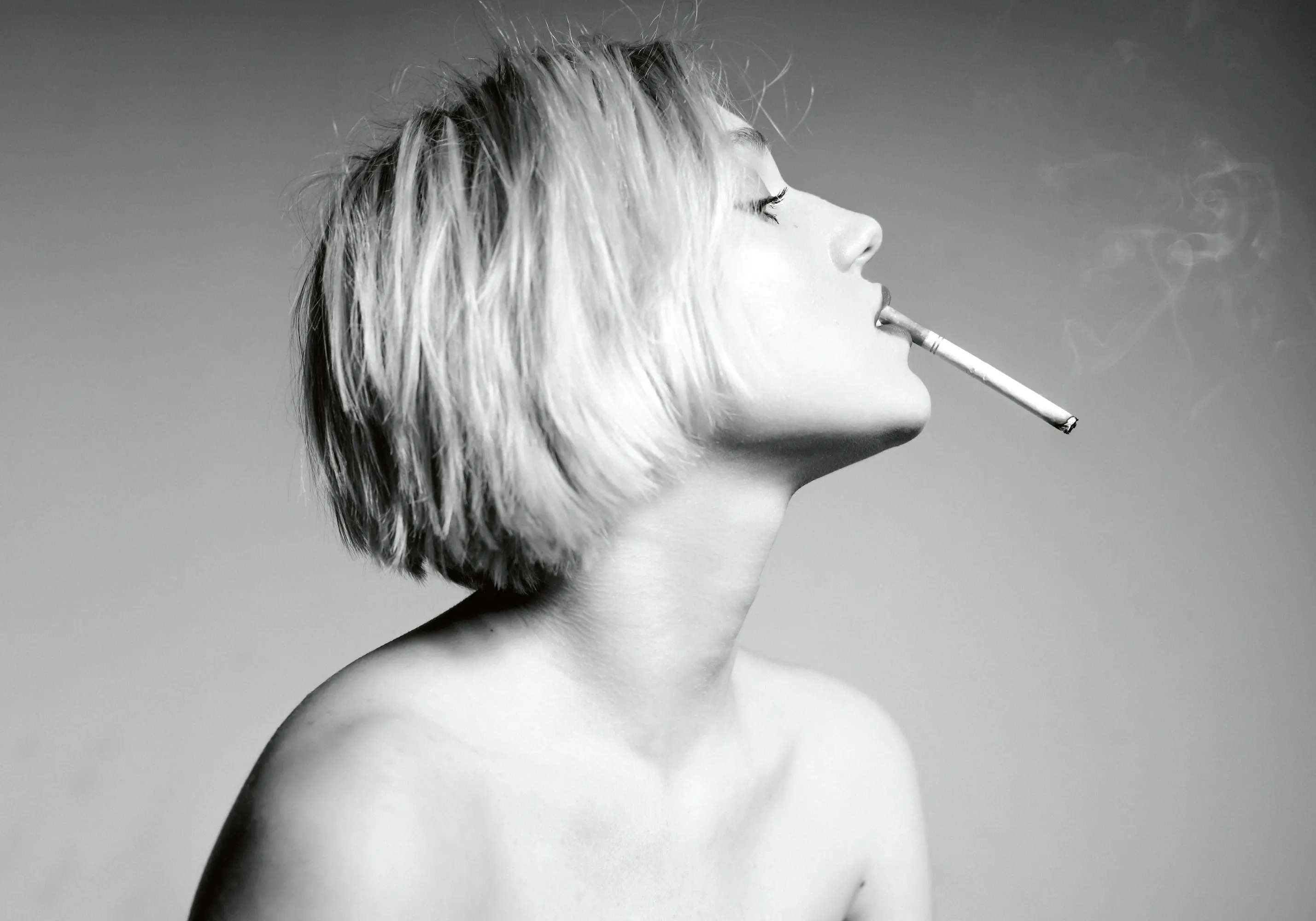 elegant woman smoking cigarette 30+ Brunette A Dangerous Stock Photos, Pictures & Royalty-Free Images Tyler McAuley - Elegant Woman