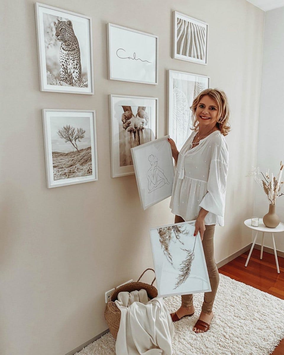 Trendy gallery wall beige interior nature leopard poster